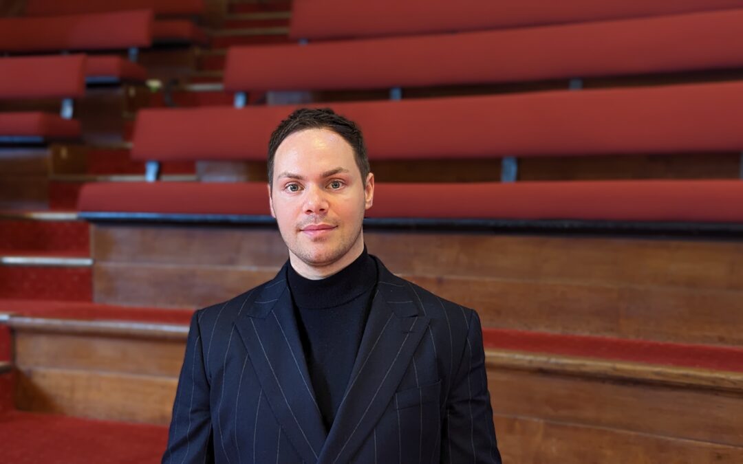 Liam Farrelly with Great Hall Choir stools in background